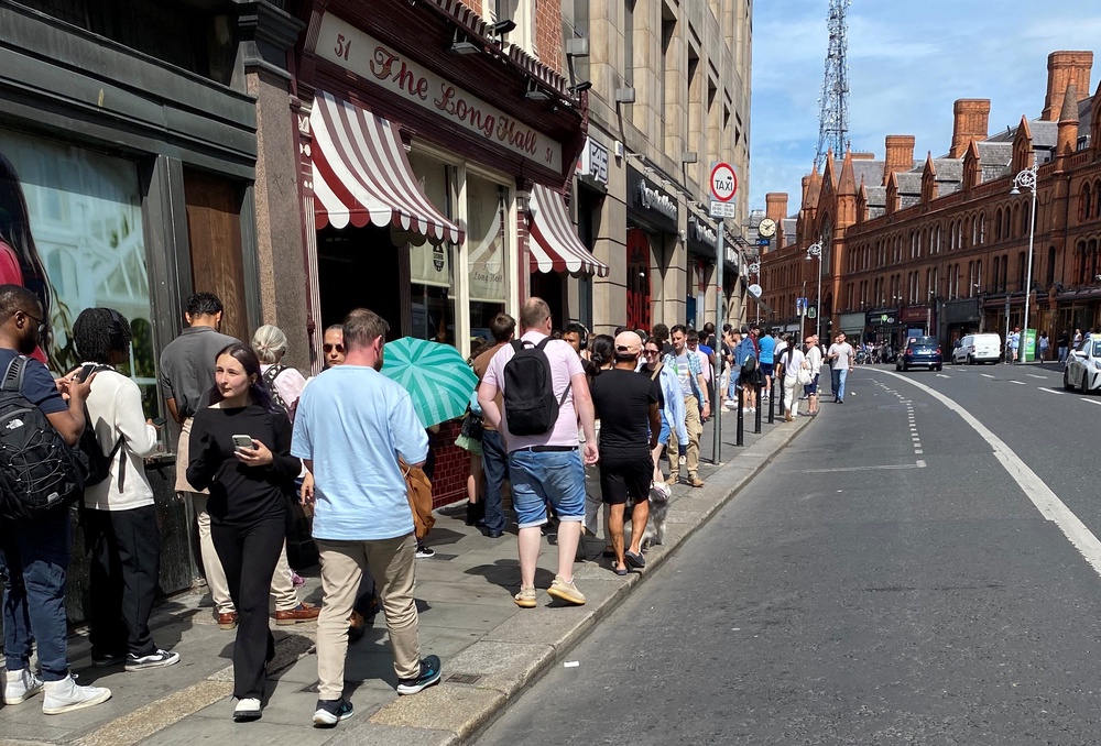 The queue continued for hundreds of yards (Jonathan McCambridge/PA) (PA Wire)