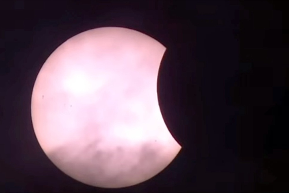 Image from: Solar eclipse 2026 live: Celestial event begins as skies turn darker across UK, US and Europe
