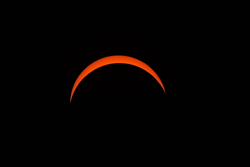 The solar eclipse seen from King's Stairs Gardens in Bermondsey, south London (Aaron Chown/PA Wire)