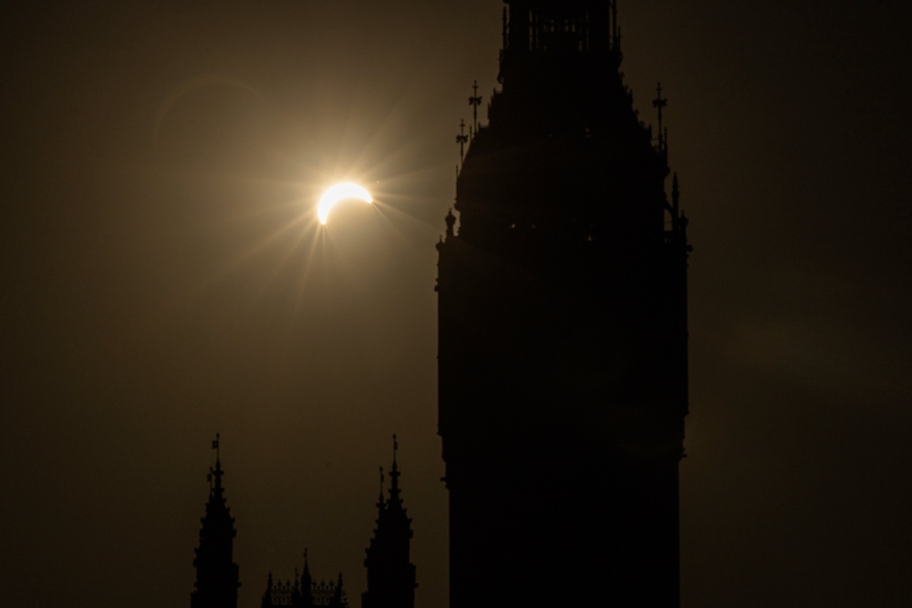 Sun thing special: The eclipse seen beside Big Ben, London (AFP/Getty)