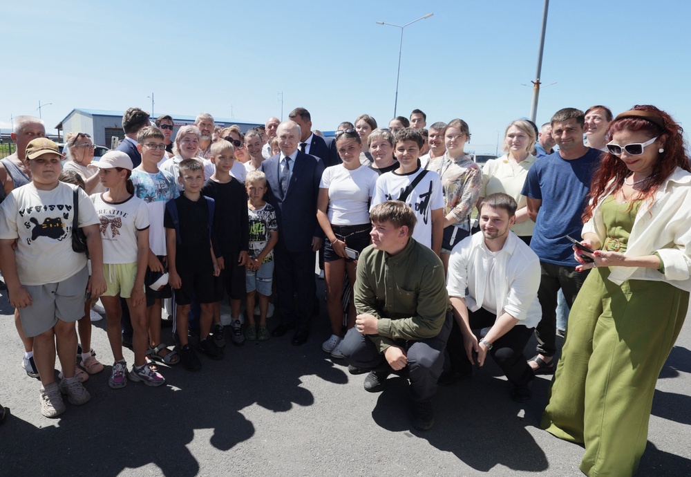 The Russian president interacted with local residents during the trip (Sputnik)