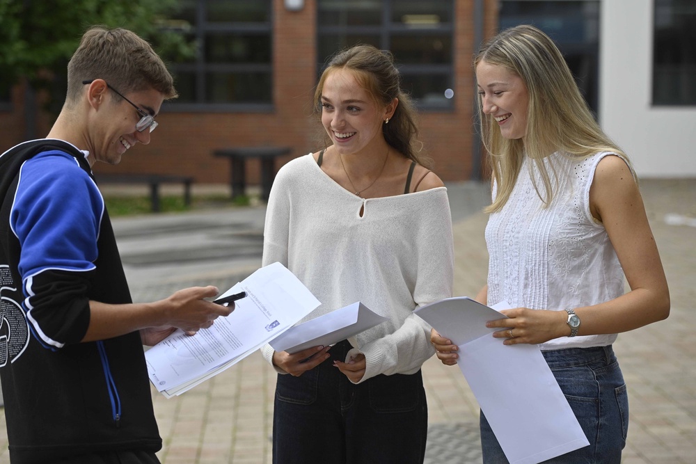 Students celebrate their A-level results at Our Lady and St Patricks College Knock in Belfast (Mark Marlow/PA) (PA Wire)