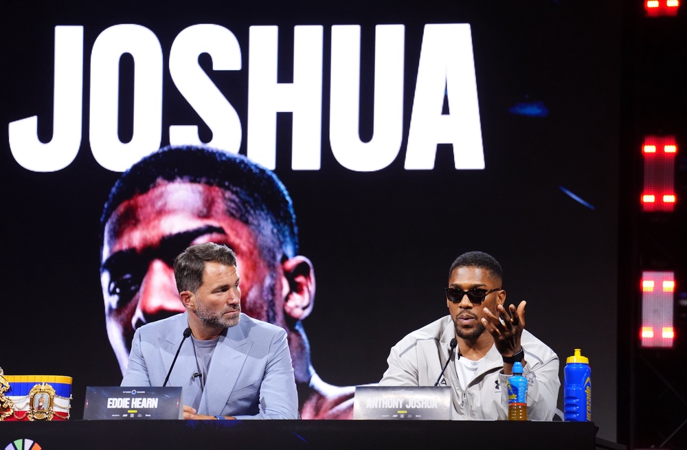 Eddie Hearn (left) and Anthony Joshua want the Tyson Fury fight to take place in the UK (John Walton/PA) (PA Wire)