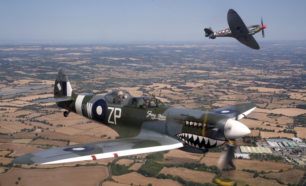 Second World War veterans Ivan Staines, 99, (bottom) and Alfred Cooley, 100, (top) during their flights in Spitfires at Biggin Hill Airport, Kent (Andrew Matthews/PA) (PA Wire)