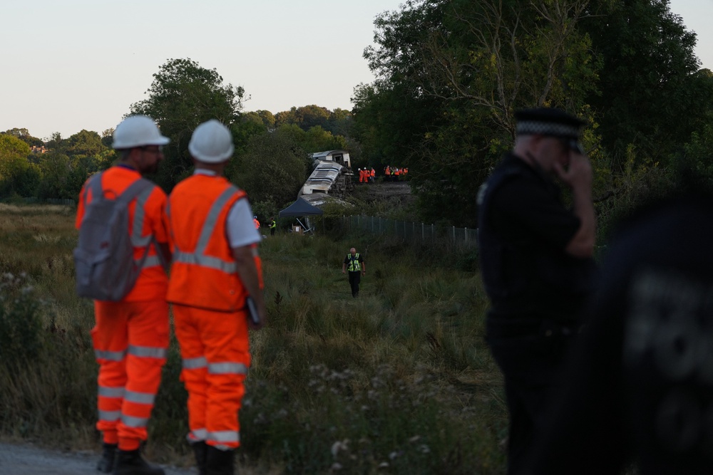 Rail and emergency workers helped free people who had initially been trapped on board (AFP/Getty)