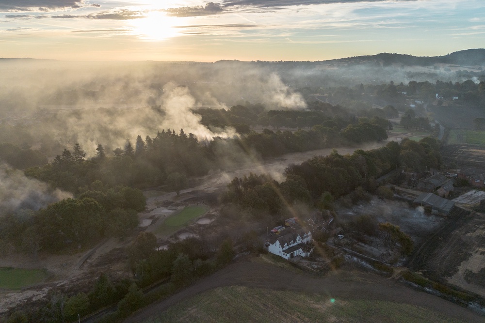 An extensive wildfire has spread to at least six homes on the edge of the golf course  in Stourbridge prompting mass evacuations and leaving two people suffering from heat and smoke inhalation (Getty)