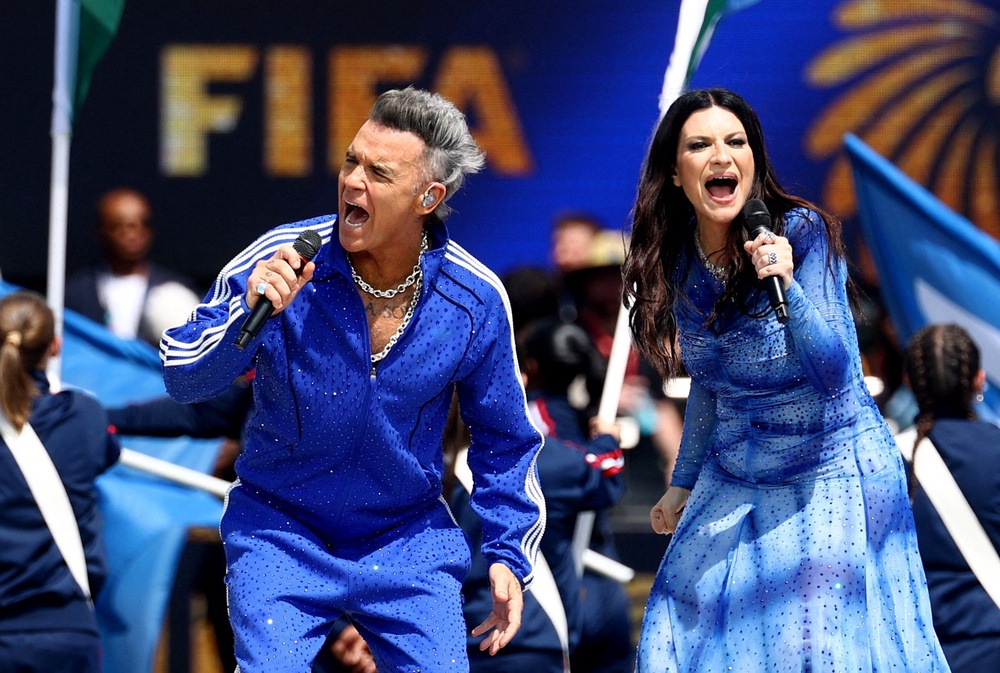 Williams, seen with Italian singer  Laura Pausini, recently performed at the World Cup closing ceremony (Reuters)