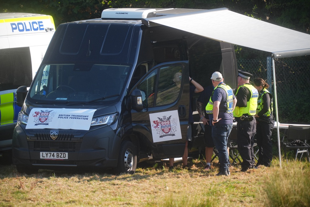 Officers from the British Transport Police near the scene where a train derailed near Lewes (James Manning/PA) (PA Wire)