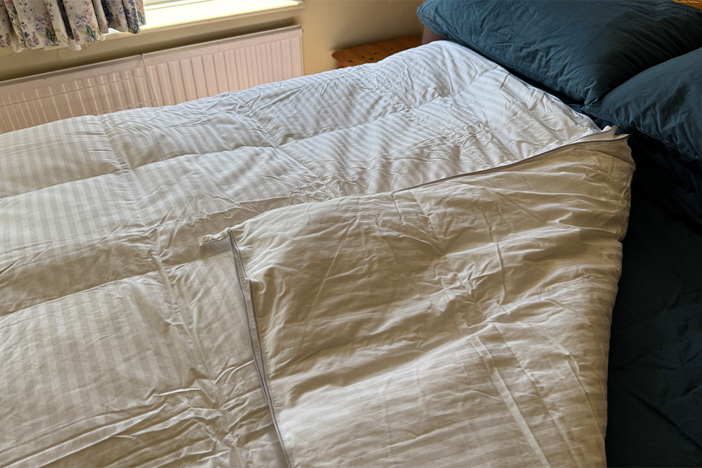 You can also attach the two duvets together, although it’s a shame that there aren’t buttons all the way around (Jo Plumridge/The Independent)