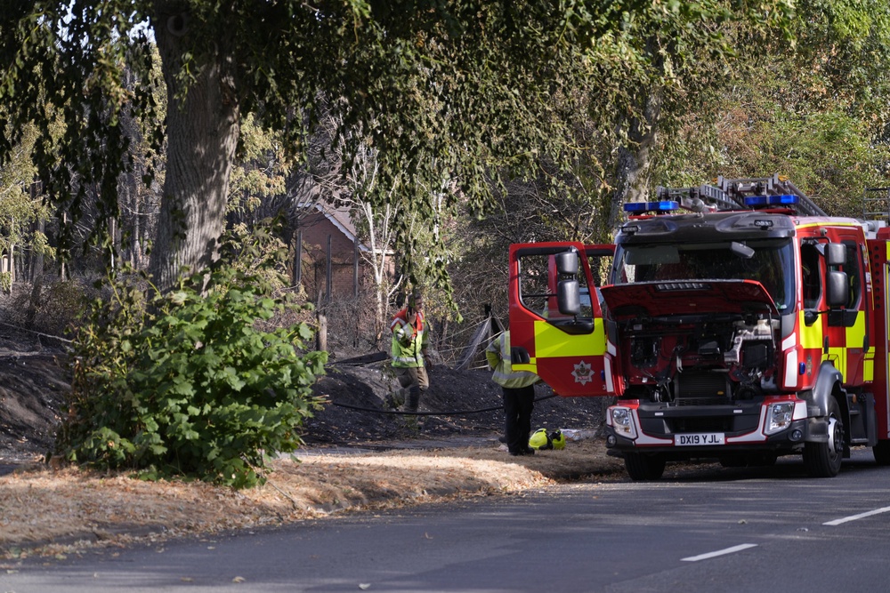 Firefighters remain at the scene of several fires in the region (Peter Byrne/PA) (PA Wire)