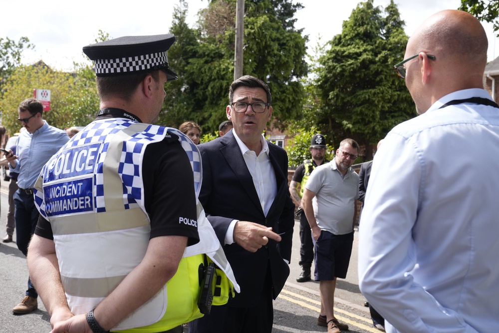 Prime Minister Andy Burnham visited the scene of a fire in Stourbridge in the West Midlands on Friday (Peter Byrne/PA) (PA Wire)