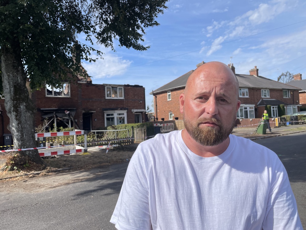 Andrew Reynolds, 42, standing in front of his mother’s house (Sophie Robinson/PA) (PA Wire)