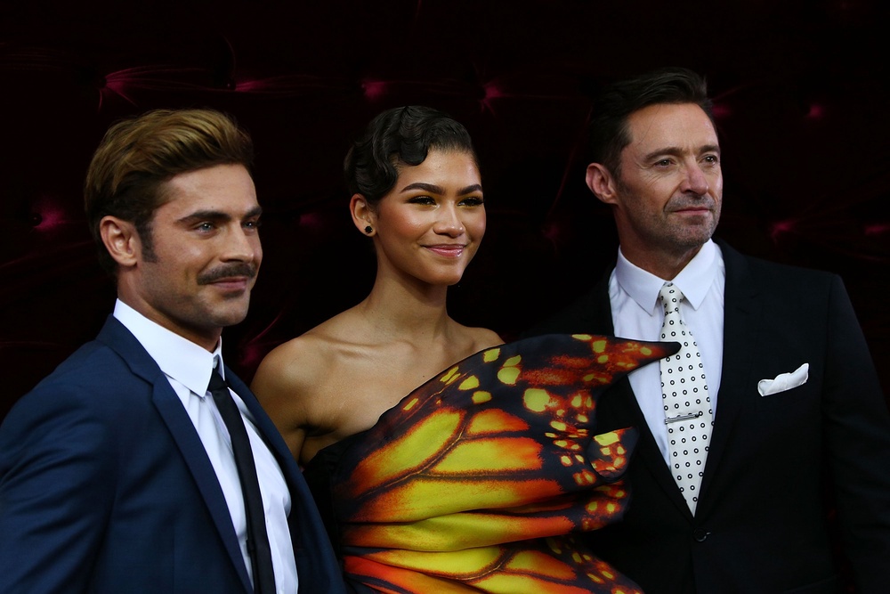 The 2017 film featured Zac Efron (left), Zendaya (centre) and Hugh Jackman (right) (Getty)