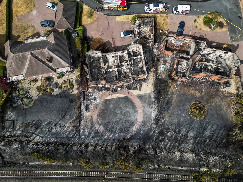 A drone view of burnt-out houses following a large grass fire which spread to several homes yesterday during the hottest day of the year, in Stourbridge (Reuters)