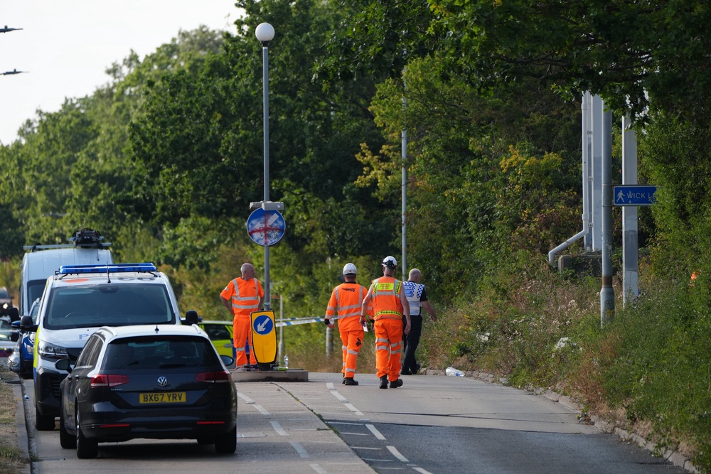 Rail workers on Salcott Crescent, Wickford, near to the scene where a Greater Anglia train derailed (Jonathan Brady/PA) (PA Wire)