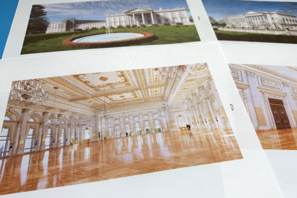Images of the planned interior show a gold-filed ballroom with marble floors (AP)