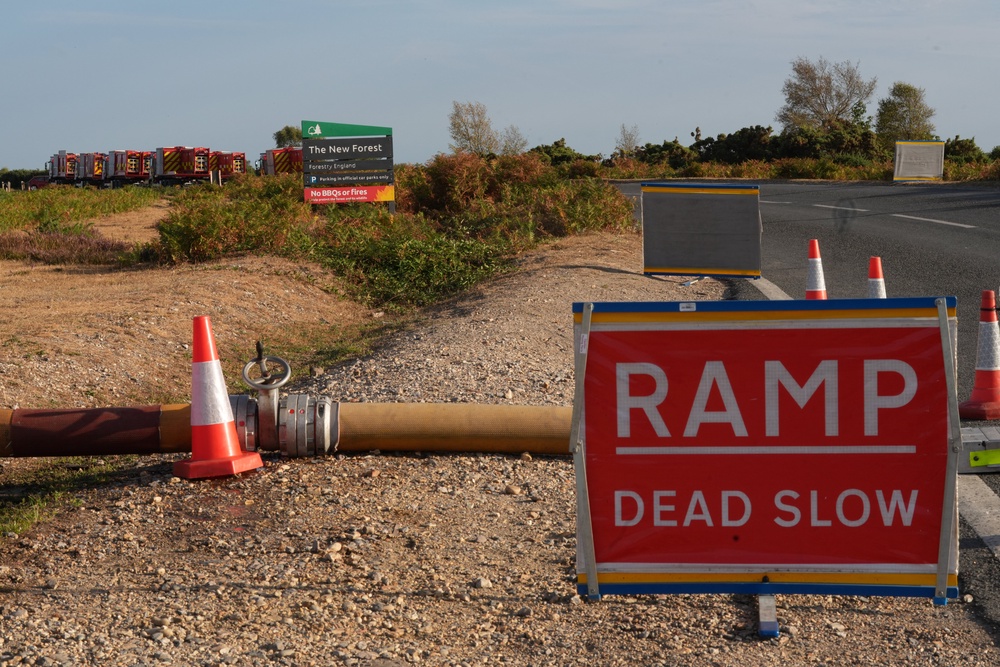 Large water pipes belonging to the fire service laid across land at Picket Post in the New Forest (AFP/Getty)