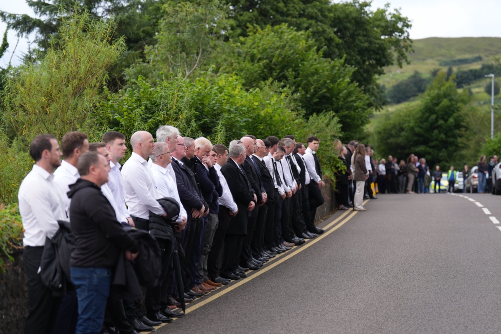 Mourners arrive for the funeral in Co Donegal (Niall Carson/PA) (PA Wire)