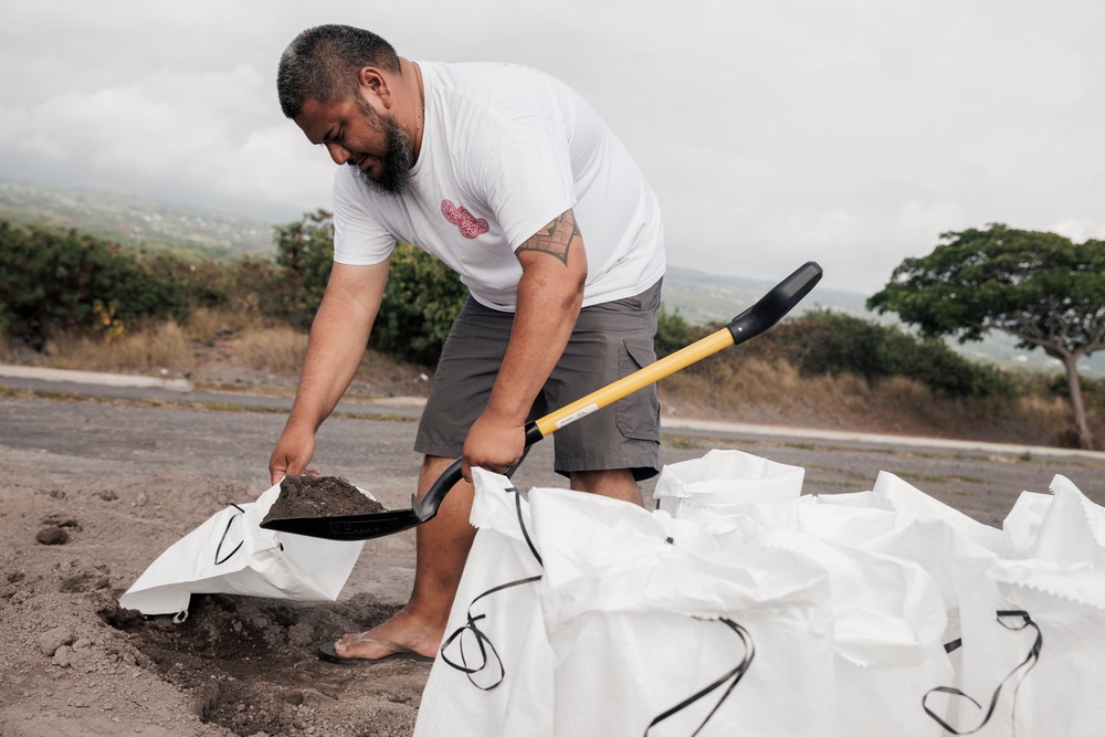 Residents pack sandbags in preparation for Tropical Storm Lala (San Francisco Chronicle)