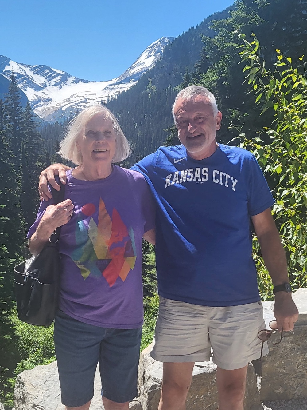 Chris Schowengerdt (left) was sitting next to her husband of 50 years, Rex Schowengerdt, (right) last month when a rock crashed through the roof of a Jeep they were riding in while visiting Glacier National Park in Montana (GoFundMe)