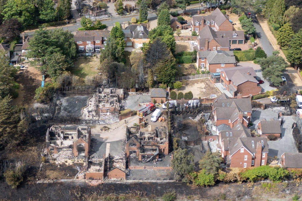 The burnt out remains of houses following a huge blaze in Stourbridge (Jacob King/PA) (PA Wire)