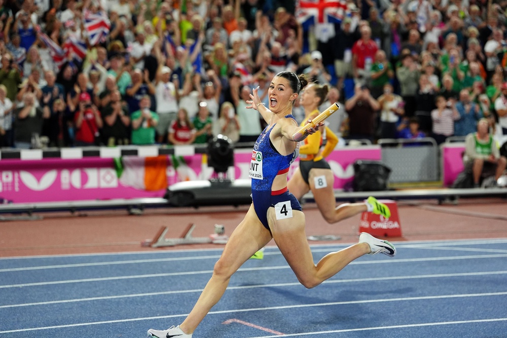 Amy Hunt celebrates crossing the finish line (Martin Rickett/PA) (PA Wire)