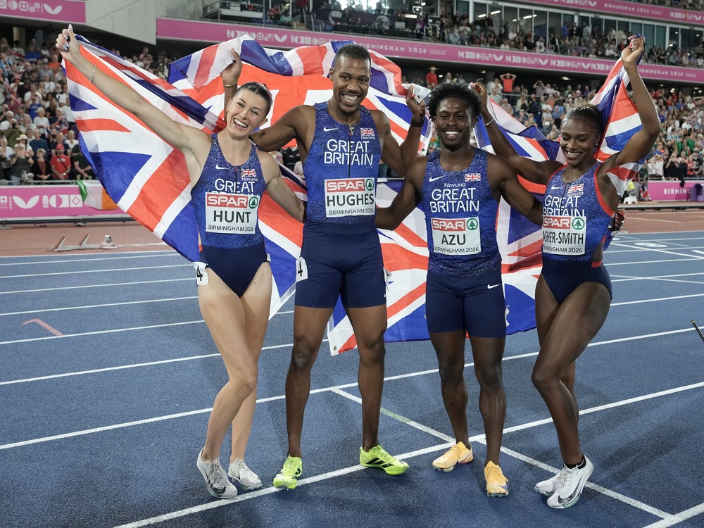 Jeremiah Azu (second right), Dina Asher-Smith (right), Zharnel Hughes and Amy Hunt (left) celebrate winning gold (Martin Rickett/PA) (PA Wire)