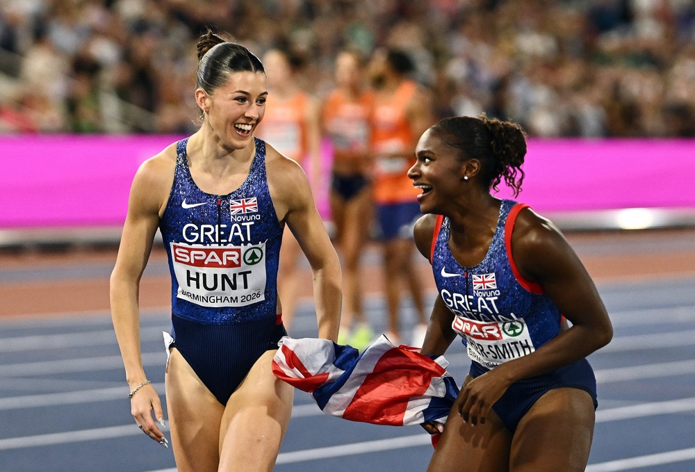 Amy Hunt and Dina Asher-Smith enjoy their victory (Reuters)