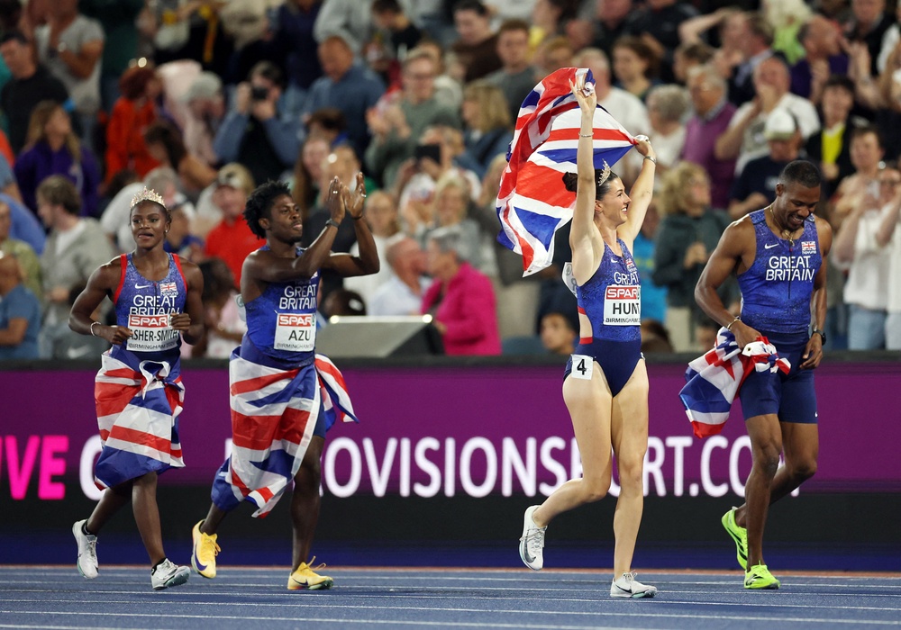 The British quartet celebrate after victory in Birmingham (Reuters)