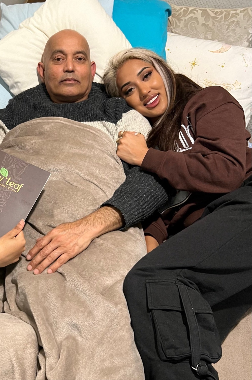 Zahida with her father while he was ill (Collect/PA Real Life)
