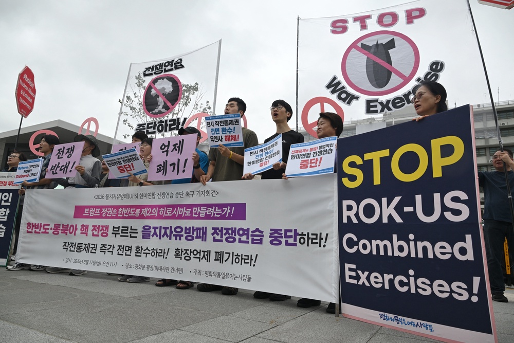 South Korean protesters hold placards as they attend a rally to oppose the joint military exercise between South Korea and the US known as Ulchi Freedom Shield (AFP/Getty)