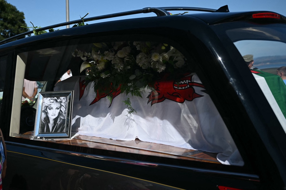 On Saturday, fans travelled from across the world to pay their respects to the singer as her coffin, draped in a Welsh flag, was returned to the Mumbles (AFP/Getty)