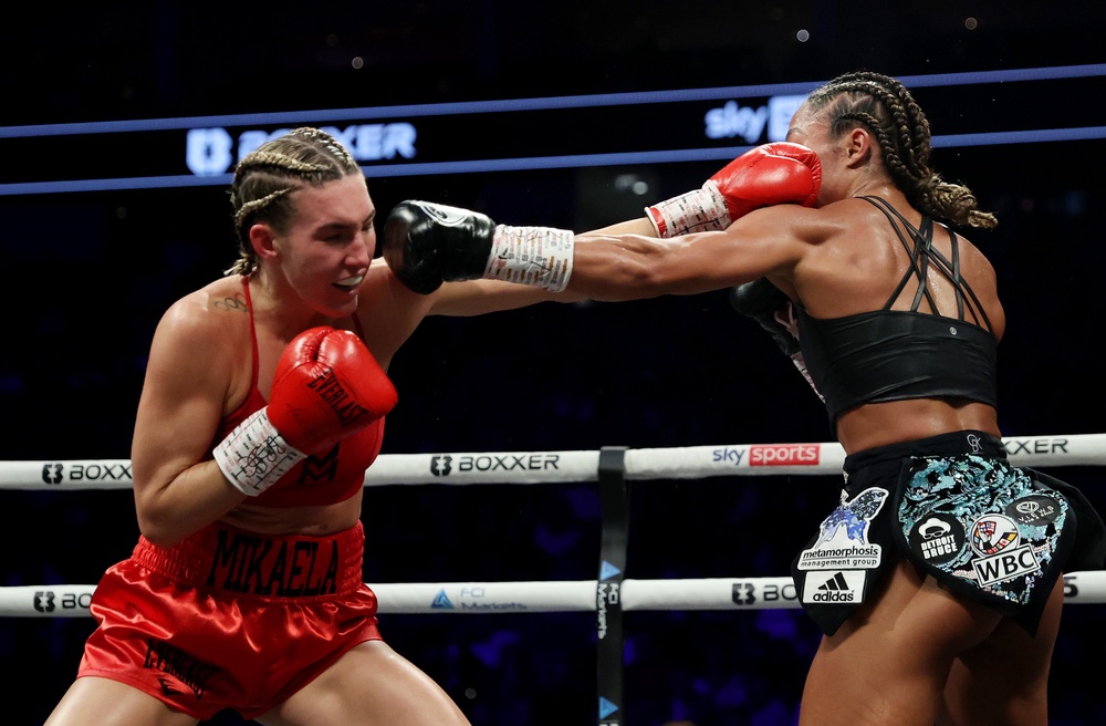 Mikaela Mayer (left) has lost two razor-close decisions but has otherwise been stellar as a pro (Getty)