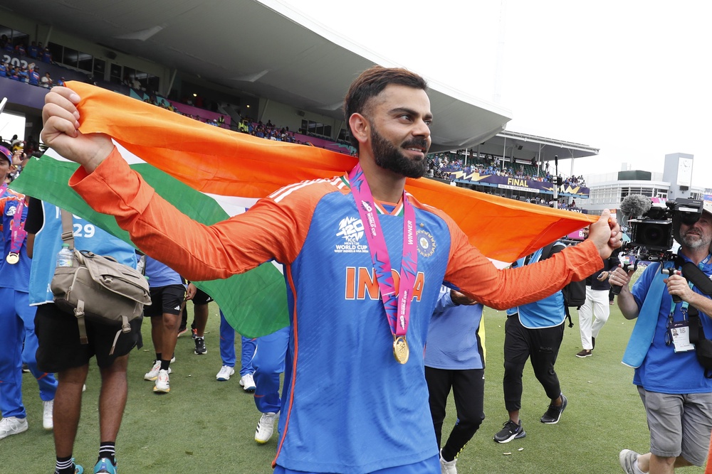 Jordan Cox cosied up to Virat Kohli, pictured, at the Indian Premier League (PA) (PA Archive)
