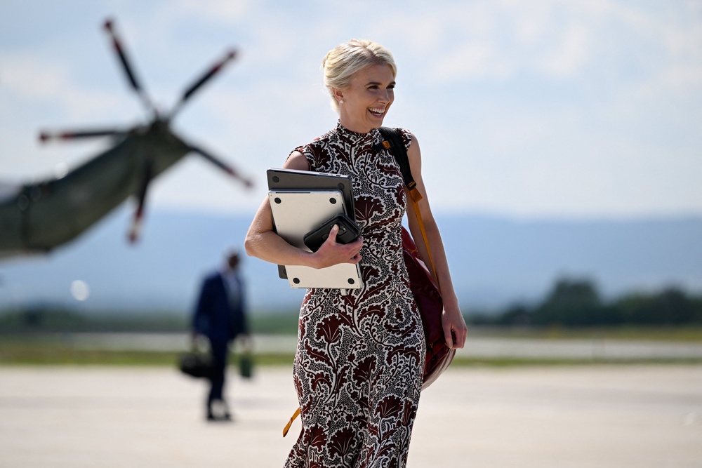 Harp’s nickname ‘the human printer’ stems from her job to print out physical copies of social media posts, articles, op-eds and messages for President Trump to review. One New York Times report alleged Harp carried a portable printer around to do so at any given time (Reuters)