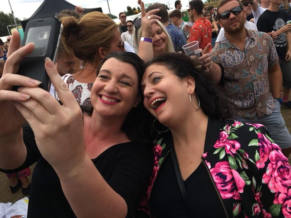 Lucy Rhoades (left) recognised something was wrong with her friend Leslie Sinoway (right) and delivered back blows, dislodging the bone (PA)