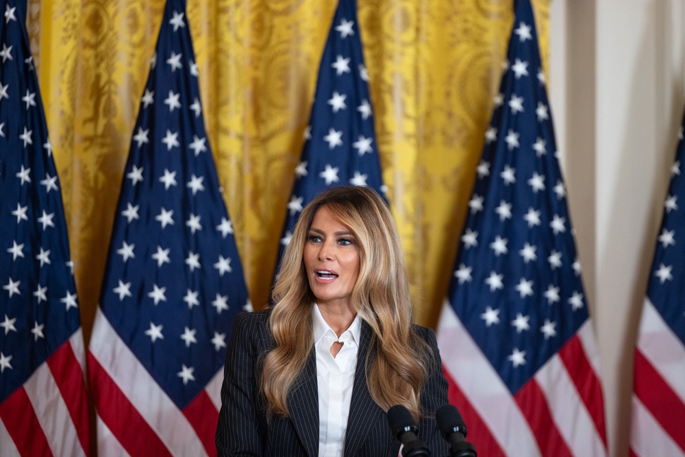 First Lady Melania Trump has not appeared publicly in nearly a month, while Trump aide Natalie Harp has become a near-constant presence by the president’s side (Getty)