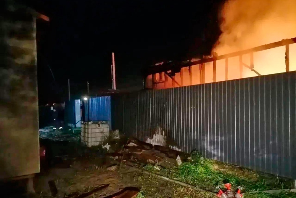 A warehouse on fire in Moscow after a Ukrainian drone strike on Tuesday morning (AP)