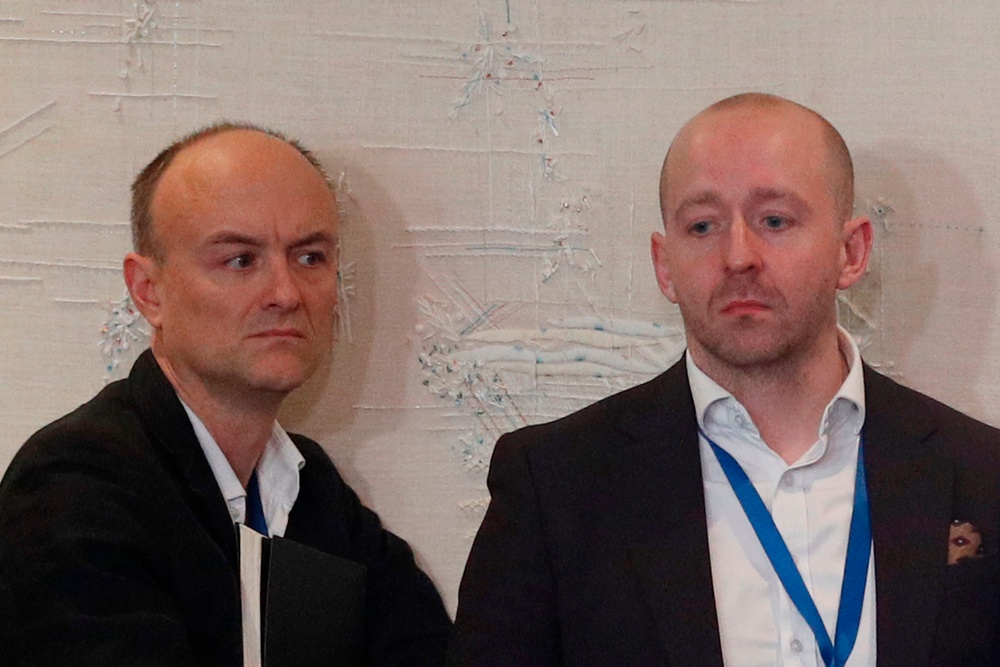 Dominic Cummings and Lee Cain at Boris Johnson's NATO press conference in 2019 (AFP/Getty)