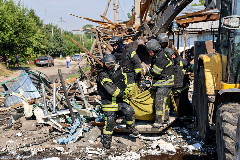 Rescue teams have begun to assess and clear the damage, with president Zelensky vowing to respond to the attack (Reuters)