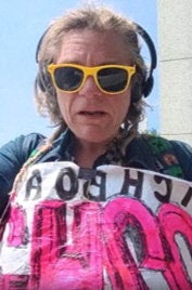 Melissa Farris, 41, faces two felony charges for allegedly vandalizing the World War 2 Memorial in Washington DC (VIDEO BY MELISSA LOVEWELL/SCREENSHOT RELEASED BY US ATTORNEY PIRRO VIA X/via REUTERS)