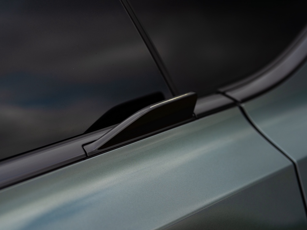 The Volvo EX60's novel 'bat wing' door handles actually contribute to a couple of miles' extra range (Volvo)