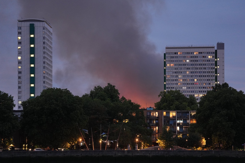 Smoke and flames from a blaze on Landmann Way, in Deptford (Yui Mok/PA) (PA Wire)
