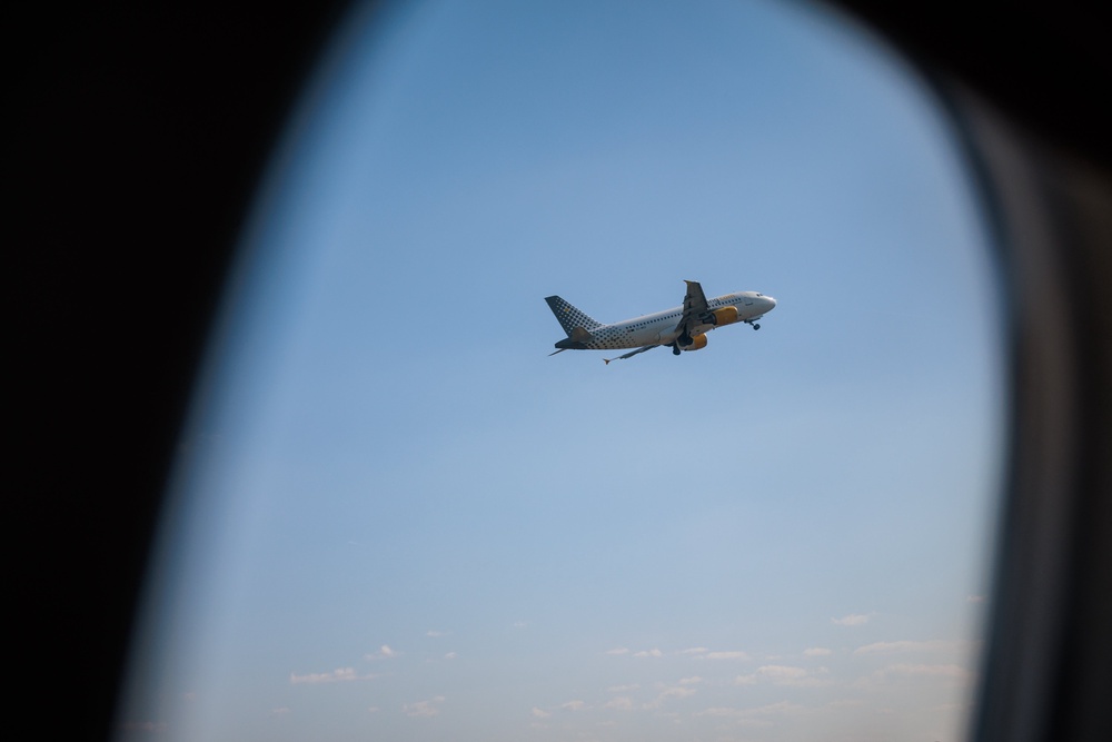 An airliner climbs after takeoff as seen through an aircraft window at Florence Airport in Florence (Hans Lucas/AFP via Getty Images)