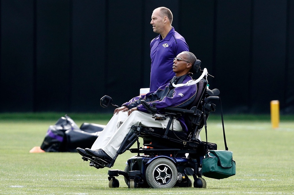 O.J. Brigance watches an NFL football training camp practice in 2017 (AP)