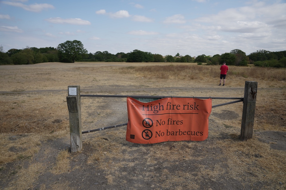 A sign posted at Hollow Pond in east London, warning of the risk of starting fires