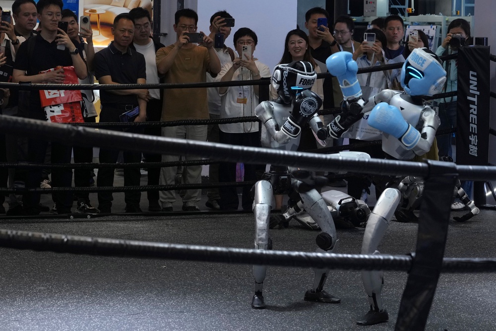 Unitree Robotics machines box during the World AI Conference in Shanghai (AP)