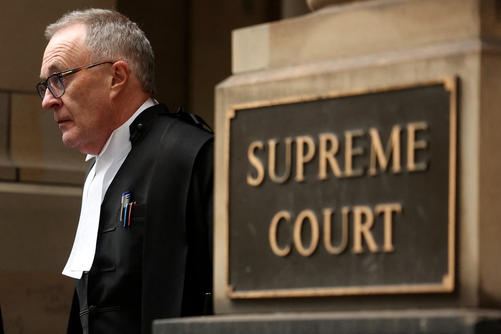 Brendan Kissane, Victoria's director of public prosecutions, leaves the Supreme Court of Victoria after the first day of Erin Patterson's appeal hearing in Melbourne on 19 August 2026 (AFP/Getty)