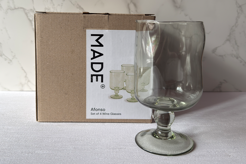 This set is great for colour and atmosphere but the green glass does change the appearance of the wine (Jonathan Hatchman/The Independent)