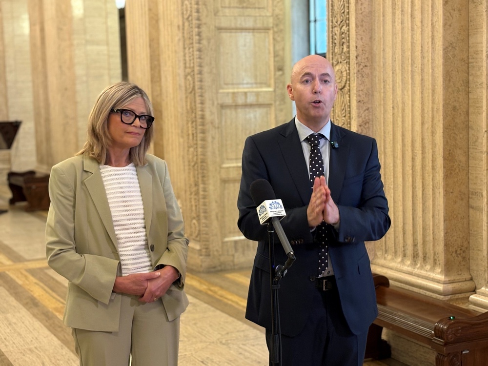 Ulster Unionist leader Jon Burrows speaks to the media in the Great Hall of Parliament Buildings at Stormont, accompanied by deputy leader Diana Armstrong (David Young/PA) (PA Wire)